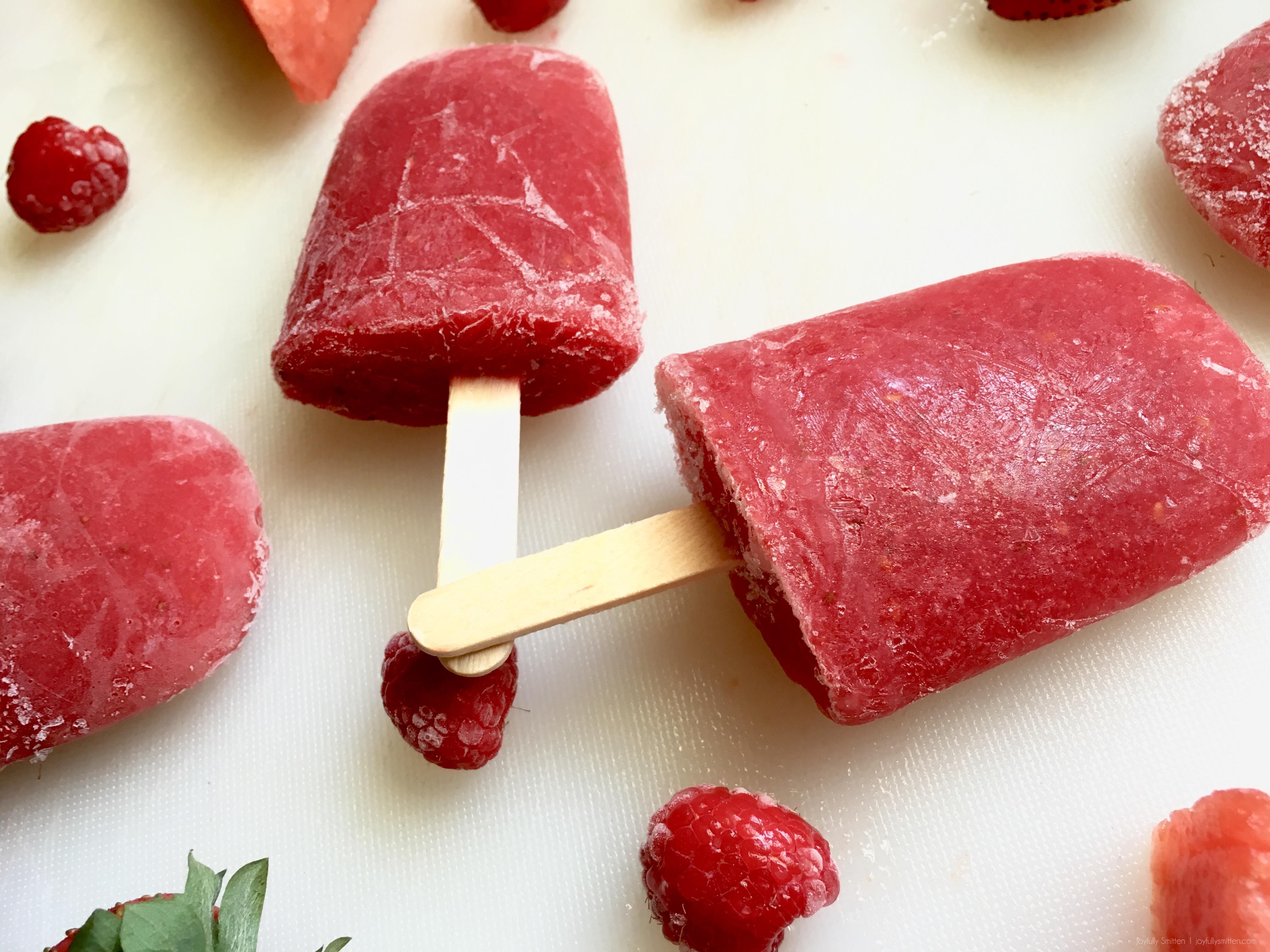 100% Fruit Popsicles that you can feel good about feeding your children. Watermelon + Raspberries + Strawberries. Hello Summertime Treat!
