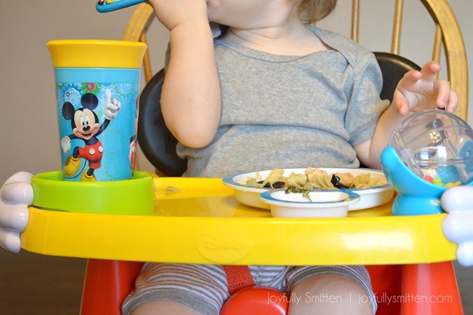 The Mickey Mouse Helping Hands Feeding & Activity Seat is a great and multipurpose booster chair that is great for food and activity!